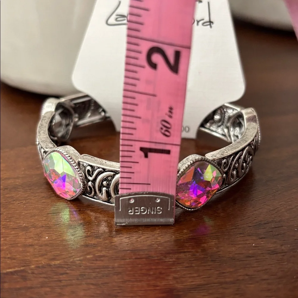 Laura Firs Stretch Embossed Silvertone w/iridescent beveled stones,stretch